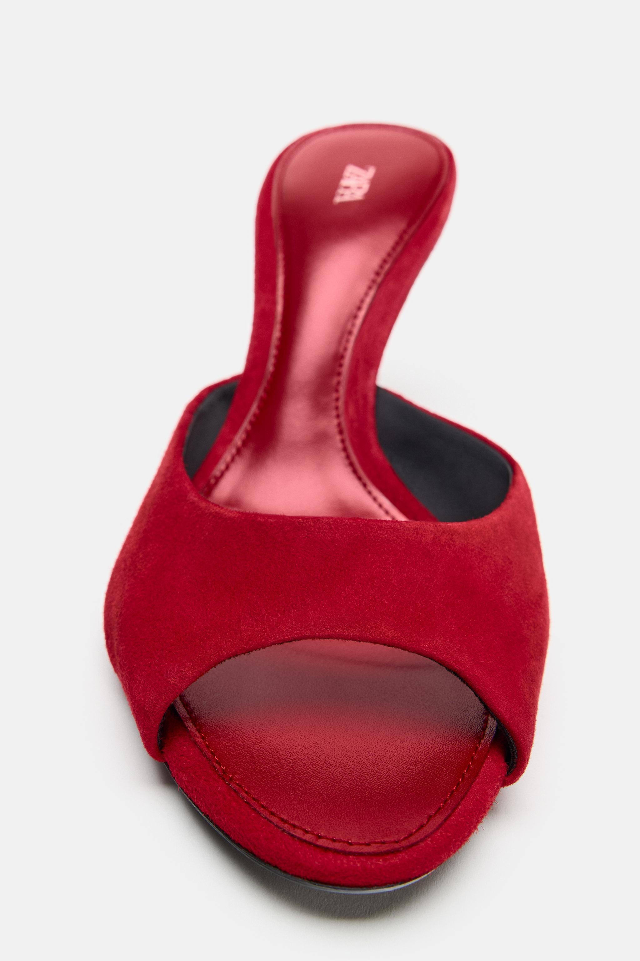 MULES À TALONS EN DAIM